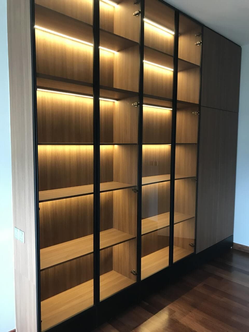 Full-height glass-door display cabinet with LED-lit shelves, Saujana Tropika, Seremban