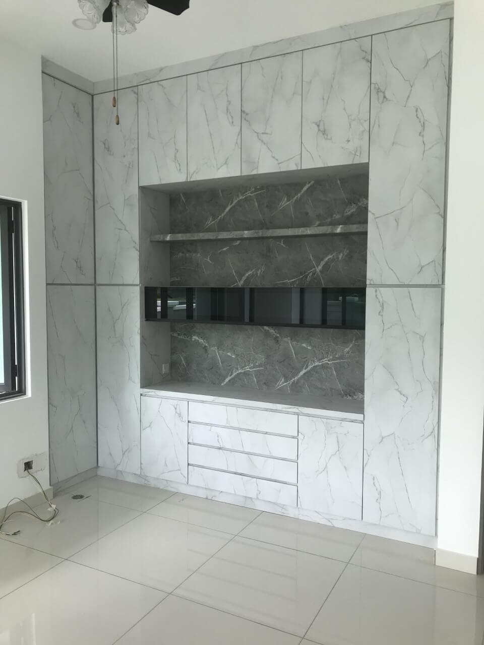 Full-height marble-effect cabinet wall with shelf niche, glass box and drawers, Taman Merdeka Permai, Melaka